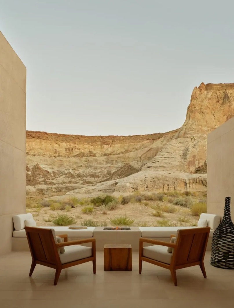 A shaded desert terrace arranged for guests